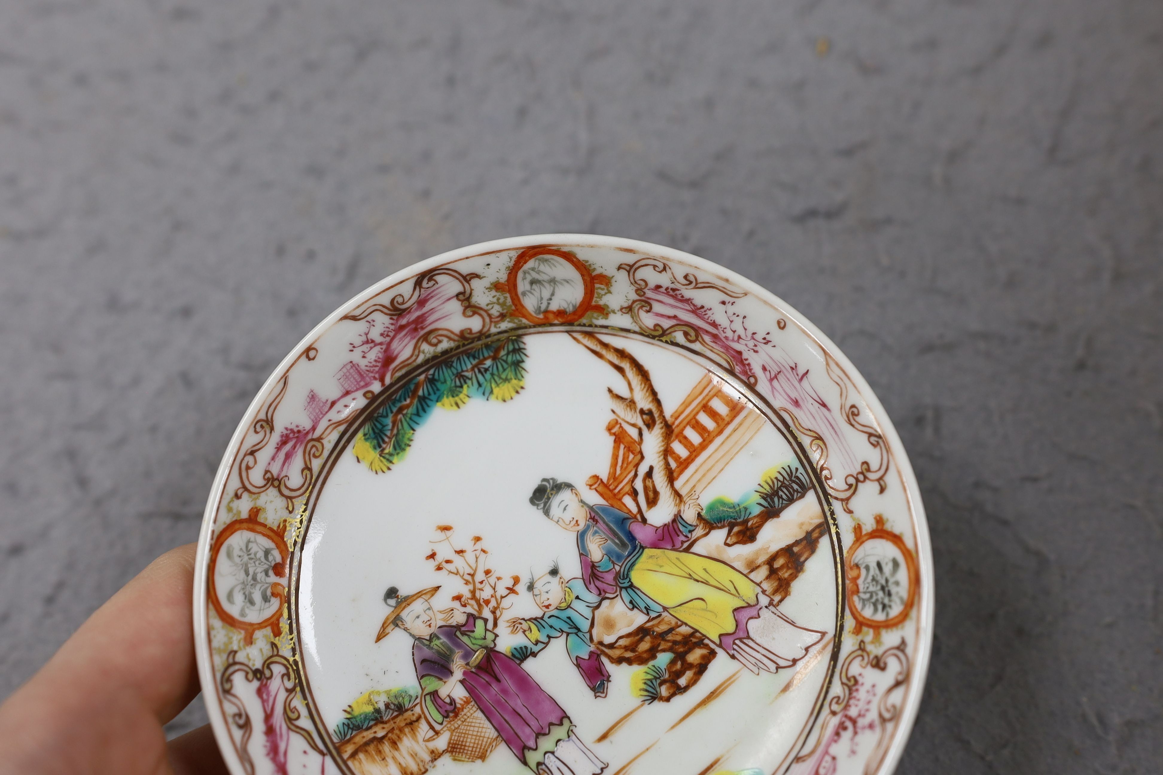 A group of four 18th century Chinese export famille rose saucers